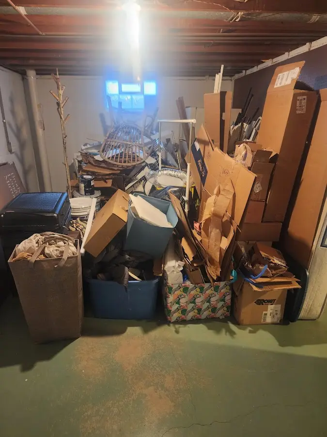 Roll-off dumpster container at job site for 8 Yard Dumpster Rental in Kirby